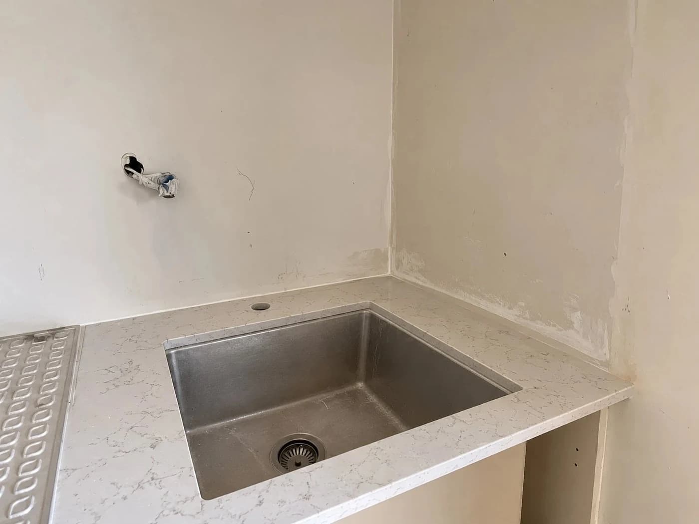Laundry Splashback Tiling: before