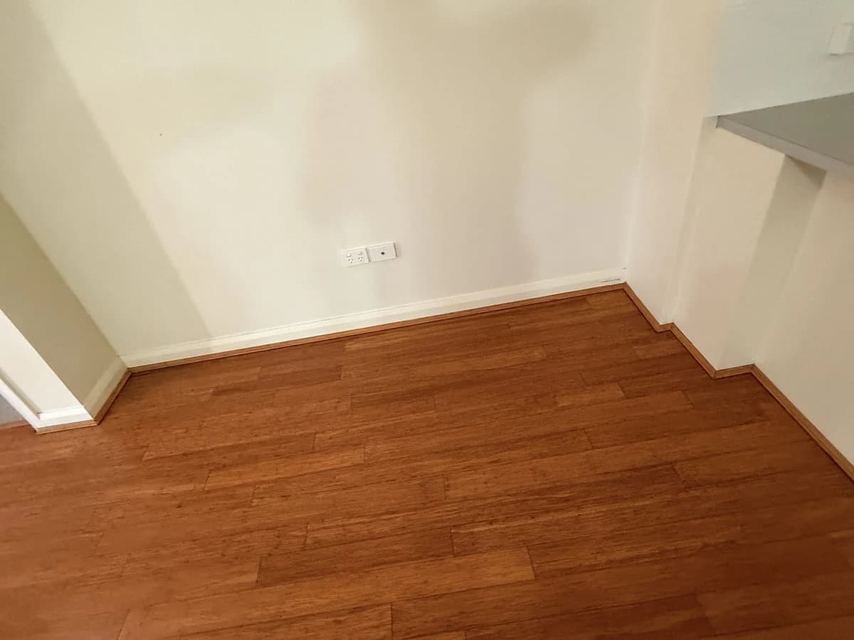Finished timber floor and skirting in a room